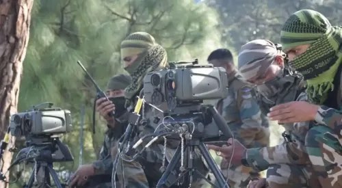 Illustrative photograph: personnel outdoors among pine trees operating optical observation equipment mounted on tripods.
